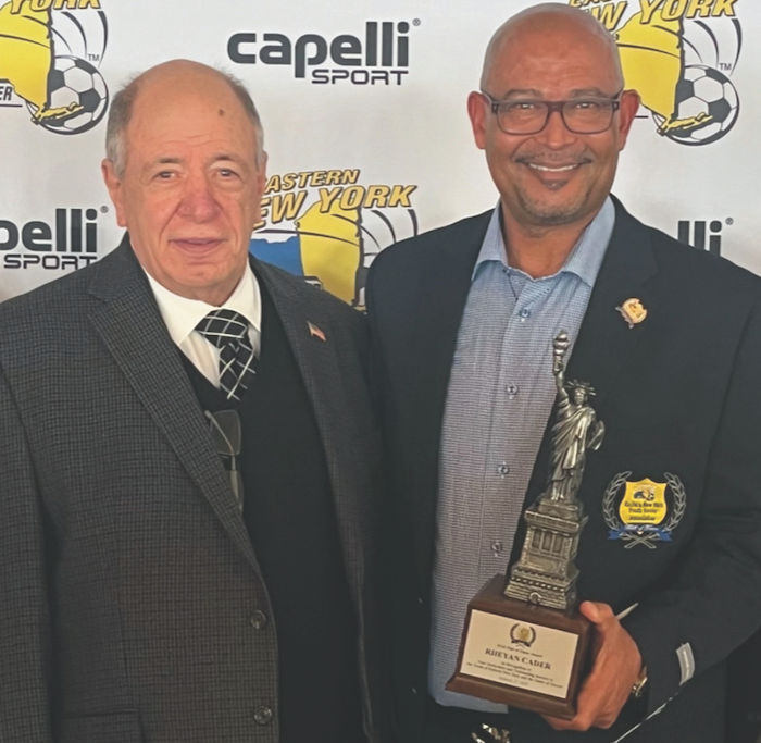Rhey Cader (right) with Richard Christiano, president of the ENYYSA