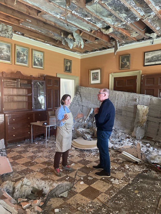 Jennifer Carlquist speaks with state Sen. Rob Rolison inside the library soon after the collapse. Photo provided