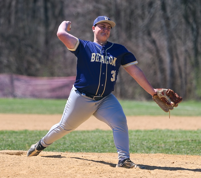Nicholas Albra fires a pitch during Beacon's win over New Paltz. Photo by Cadence Heeter