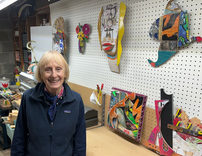 Betty Stafford in her home studio with skateboards converted to art Photo by M. Ferris