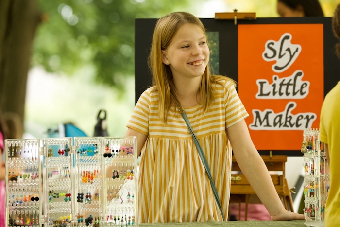 An entrepreneur sells jewelry at the Cold Spring Kid’s Business Fair in August. File photo by Ross Corsair