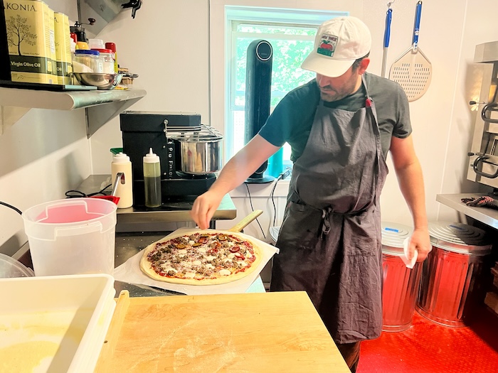 Mickey Dwyer puts the finishing touches on a vegan pie.