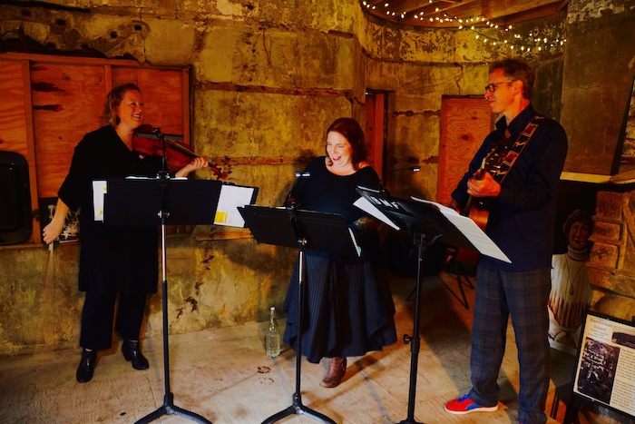 Kathleen Bosman, Kelly Ellenwood and Stephen Clair perform together as Saint Rita. Photo by Katy O'Hagan